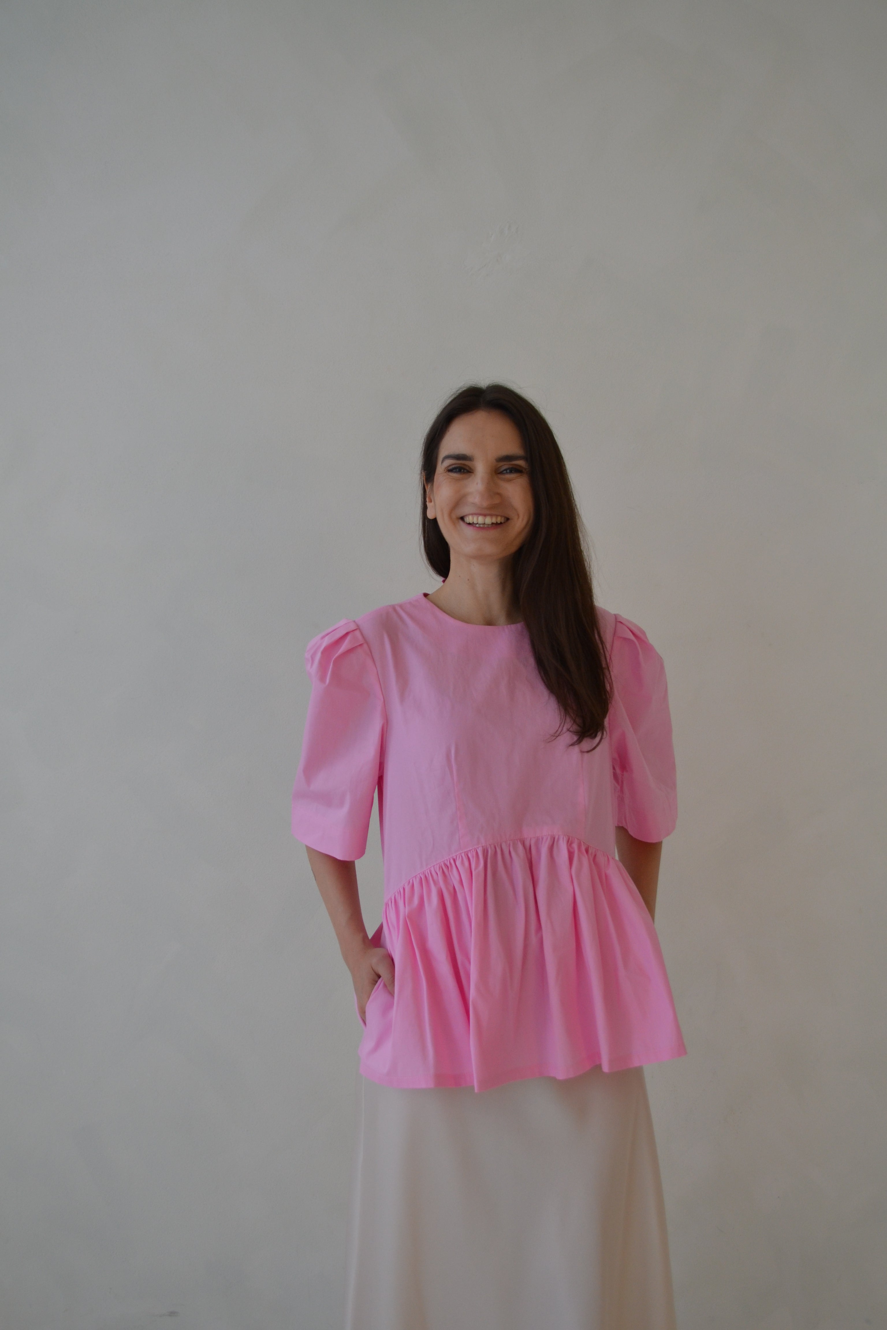 Růžový peplum top SKAIA