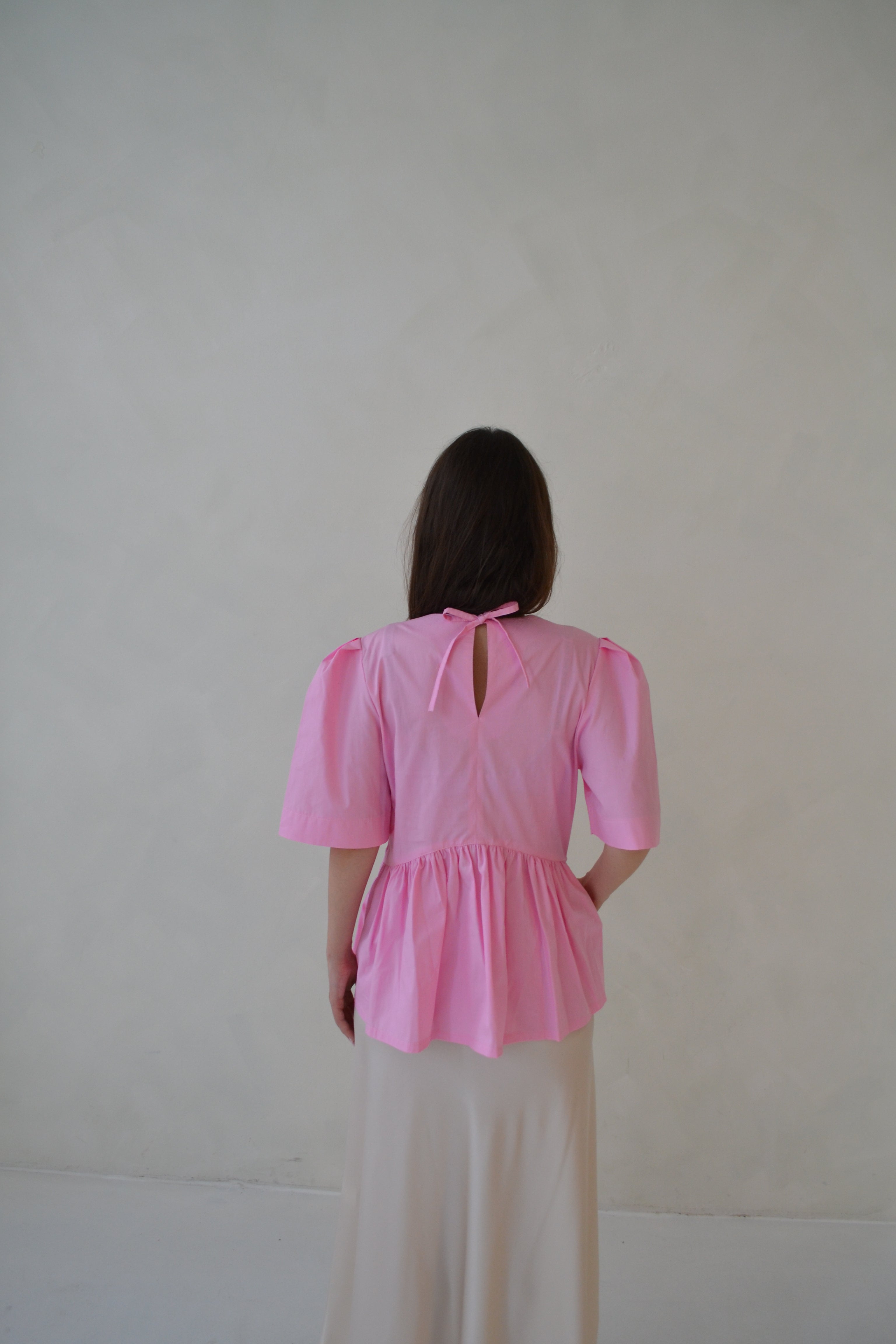 Růžový peplum top SKAIA